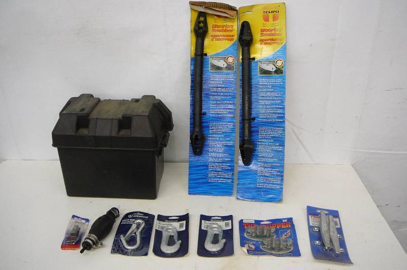 lot 46 image: Lot of Boat Stuff, Mooring snubbers, Dock cleat, The Gripper cleat, snap Hooks, Fuel Hose fitting, Primer, Battery Box
