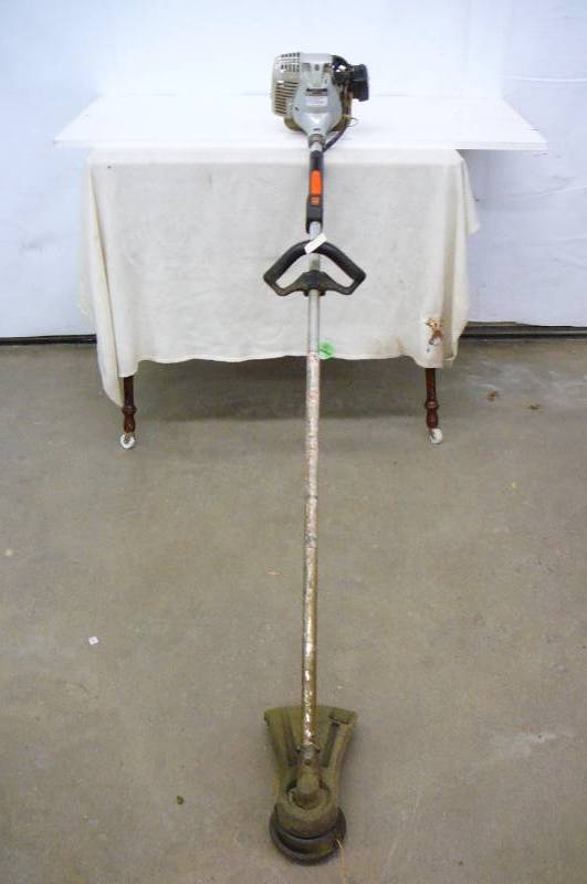 lot 63 image: Weed whipper echo srm-2510 Runs and works
